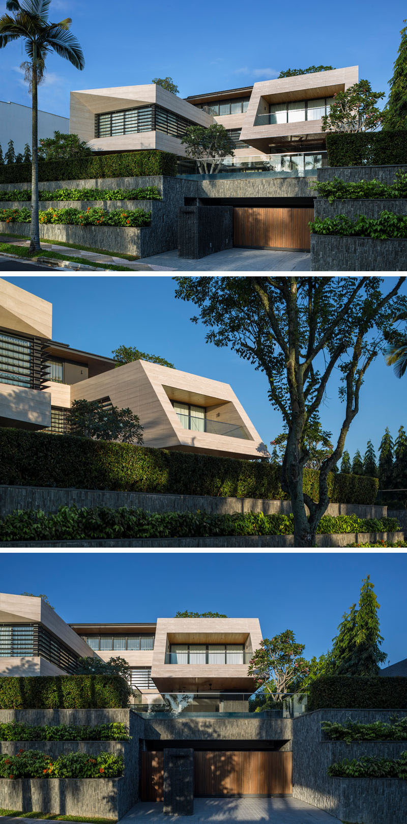 This modern house, which sits 13 feet (4m) above street level, has a slate covered terraced garden on either side of the garage and entryway. #ModernHouse #TerracedGarden #CurbAppeal