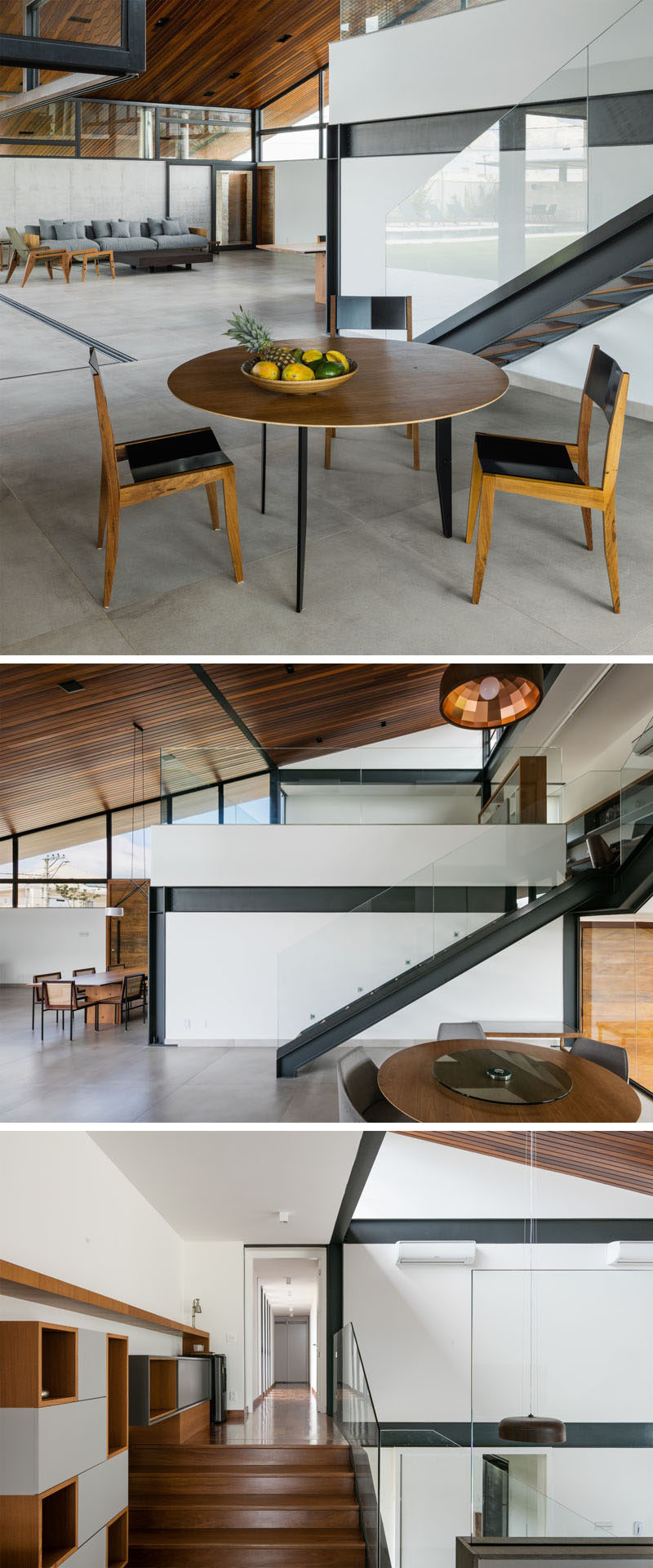 Metal and wood stairs lead to the second floor of this modern house. A glass handrail almost blends into the background. #ModernStairs #SteelStairs #GlassHandrail