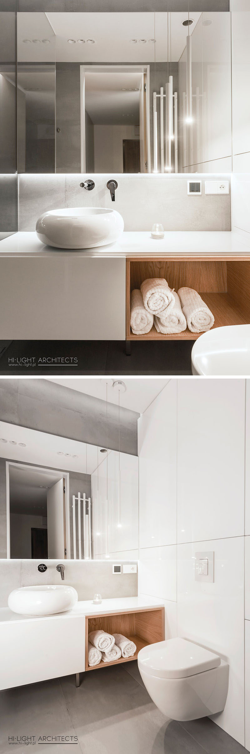 This mostly white bathroom has a blacklit mirror, grey accents and an open wood shelving space. #ModernBathroom