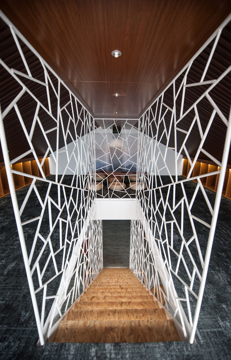 MINAX Architects have designed an 'ice-cracked' rebar safety barrier for these modern stairs. #ModernStairs #Design #Interiors