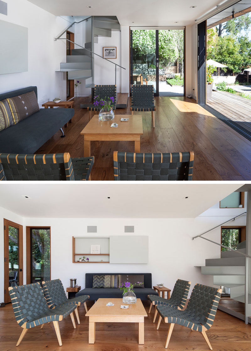 A large sliding glass door the opens this living room to the outdoors, creating an indoor/outdoor living environment. #LivingRoom #InteriorDesign #ContemporaryLivingRoom