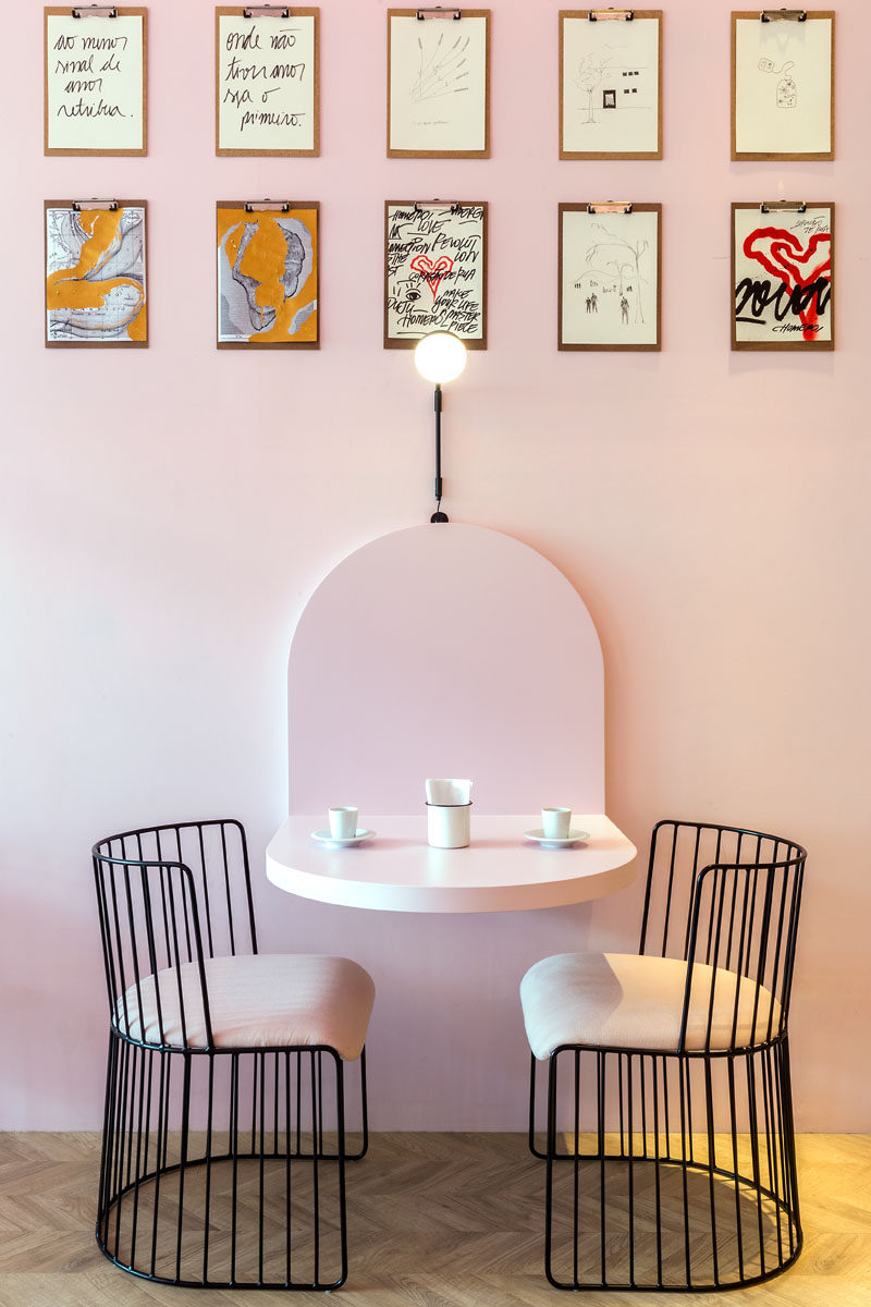This modern and pink patisserie has clipboards with customer's drawings. #ModernCafe #Patisserie #InteriorDesign