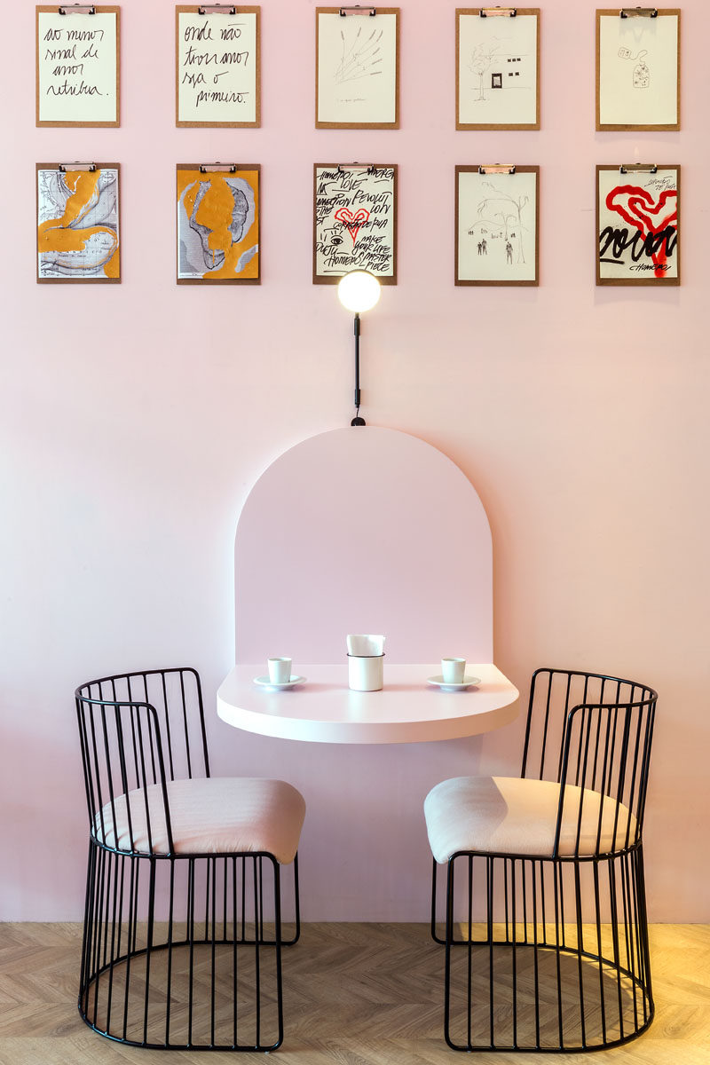 This modern and pink patisserie has clipboards with customer's drawings. #ModernCafe #Patisserie #InteriorDesign