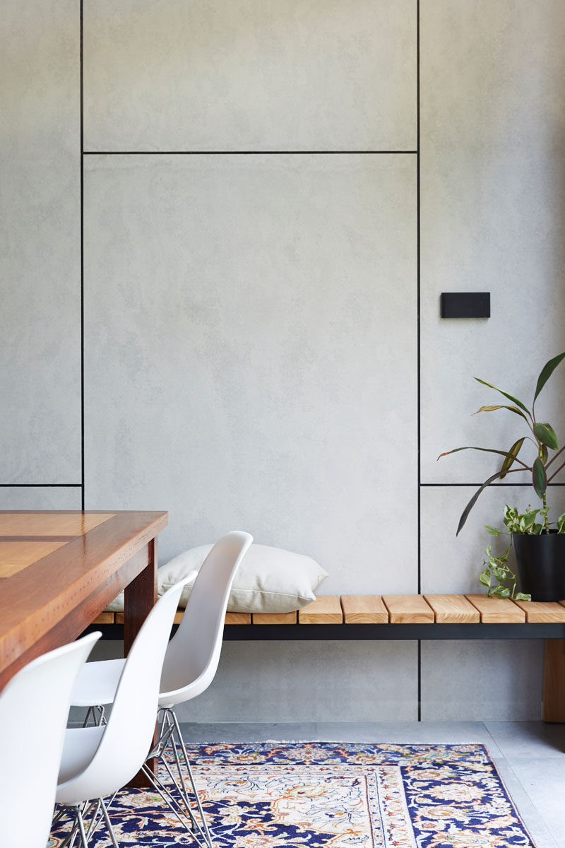 Wood touches have been used throughout this modern house to warm up the interior, like in the dining room. #InteriorDesign