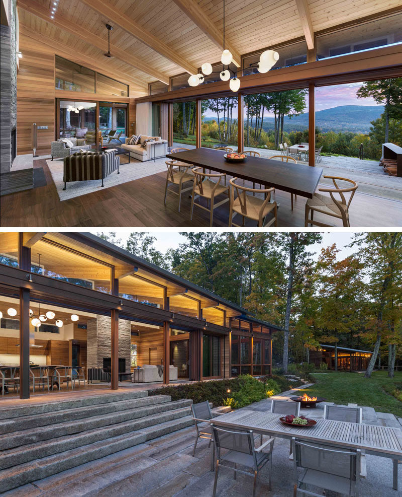 A 40-foot retractable glass door system opens up to create a true indoor / outdoor living environment for this modern house. #RetractableGlassDoors #IndoorOutdoor #ModernHouse