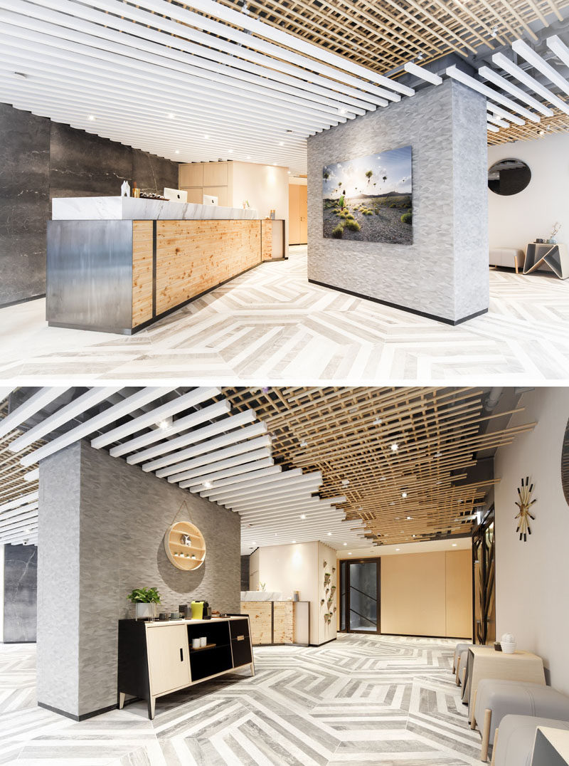 Inspired by tea houses and nature, this modern hotel uses a mix of wood, shades of grey and white, and concrete for a neutral and calming atmosphere. #ModernHotel #HotelInterior #HotelLobby #InteriorDesign