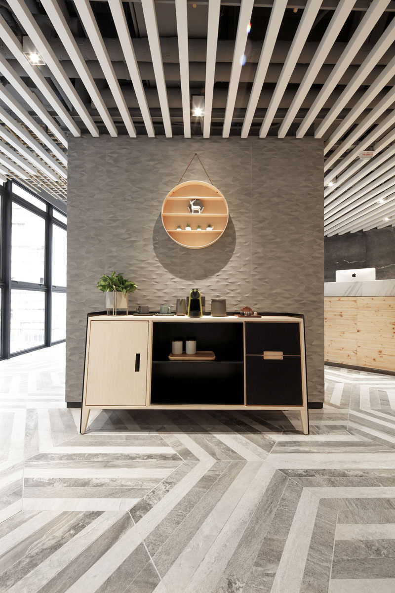 Simple furnishings have been used throughout this modern hotel, like in the lobby, where a simple sideboard has been used as a tea and coffee station. #InteriorDesign #Sideboard #HotelDesign