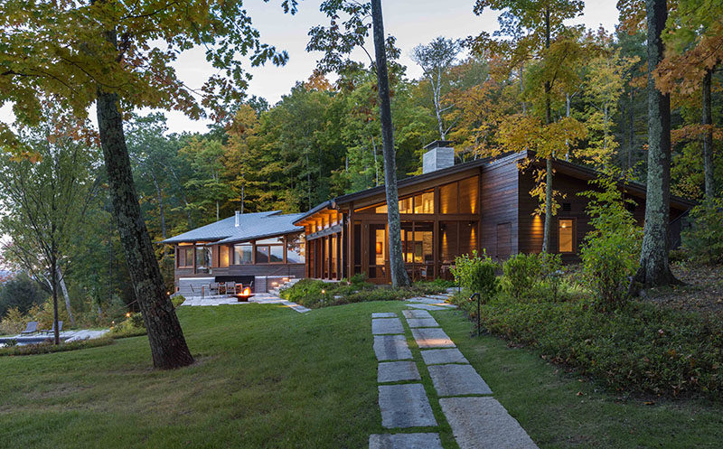 Mathison | Mathison Architects have designed a new modern wood house for a family that sits high above the Housatonic River in Great Barrington, Massachusetts. Click through to see more photos. #ModernArchitecture #HouseDesign #Landscaping