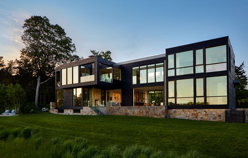 Blaze Makoid Architecture have designed a new house on Sag Harbor in North Haven, New York, for a family that love to entertain year round. #ModernHouse #BlackWood #Stone #Architecture