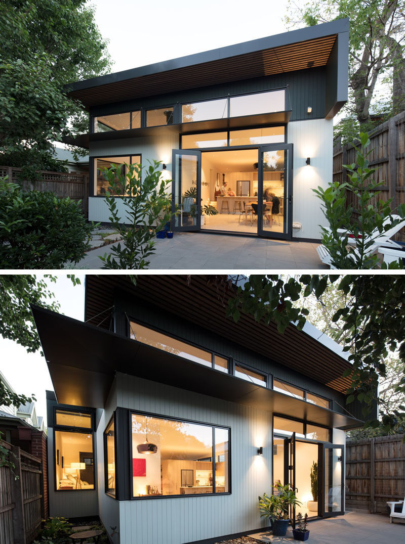 This new house extension that folding doors that open up to a small patio area, creating more living space. #HouseExtension #Architecture