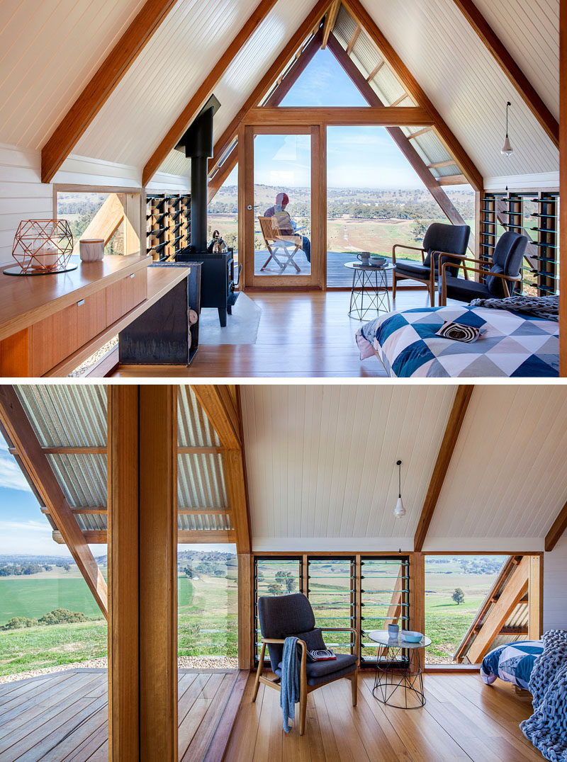 The windows follow the structural lines of this small and contemporary cabin, and there's a small living area with a door that opens to a deck with views of the valley. #Cabin #Hut #InteriorDesign #Windows