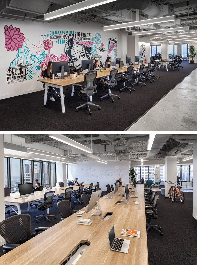 This modern office features custom street art where white walls begged for color brand identity, while long workstations can transform with the company as it grows. #OfficeDesign #Workplace #InteriorDesign