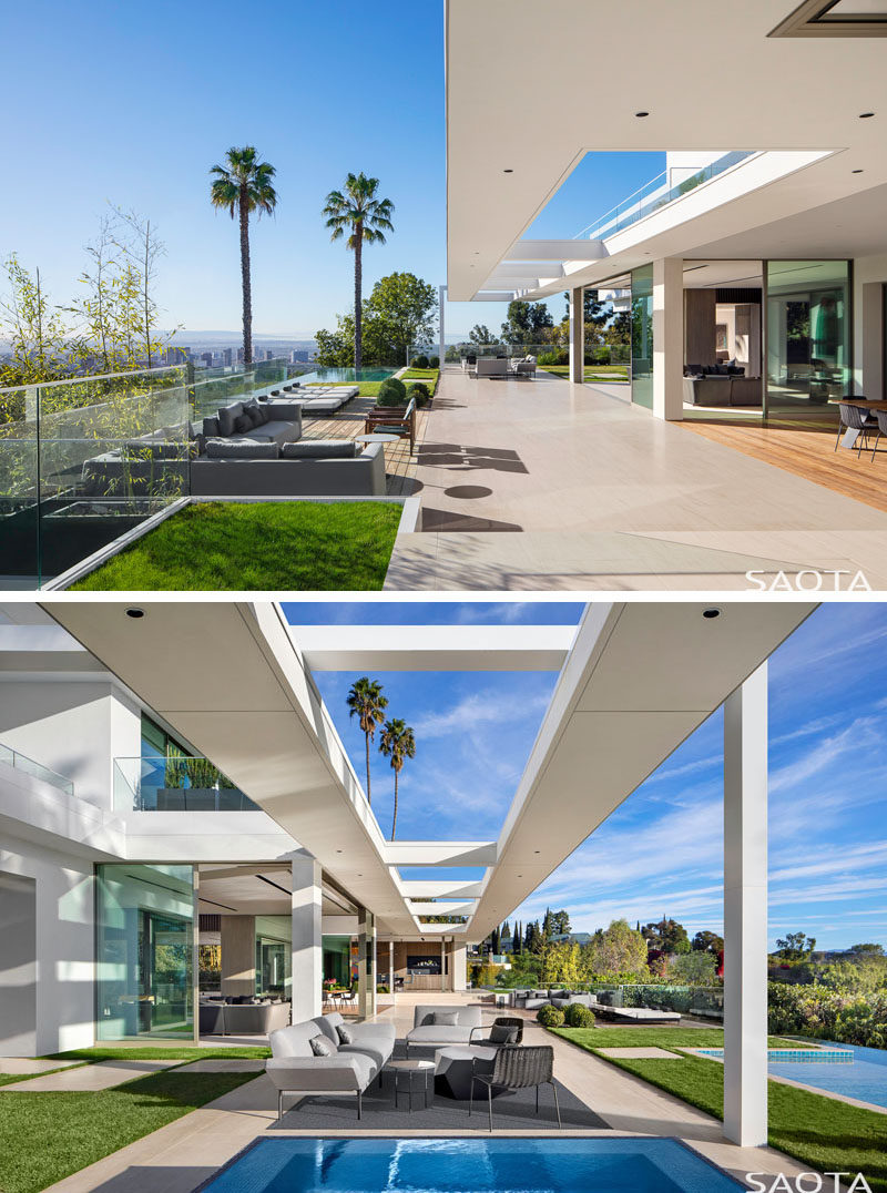 This modern pool terrace has low level planting, grassy areas and multiple lounges create a relaxing atmosphere. #SwimmingPool #Landscaping #OutdoorLounge