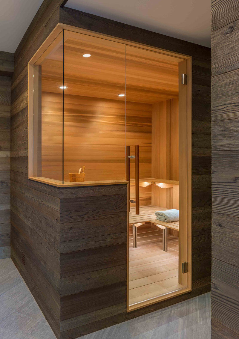 This modern sauna has been specially designed to include glass panels that provide continuous views. #Sauna #ModernSauna