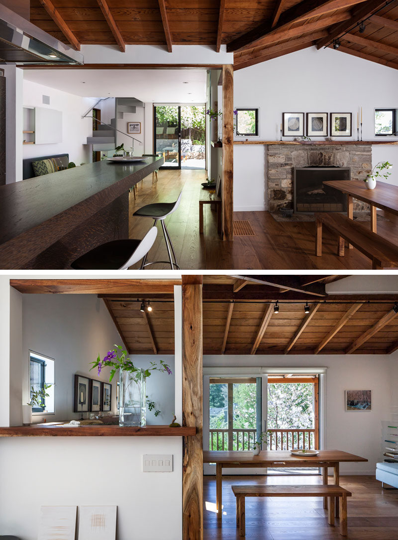 This contemporary cottage renovation has a dining area that's positioned to take advantage of the Sonoma stone fireplace, and the view of the trees through the sliding door. #DiningRoom #Fireplace