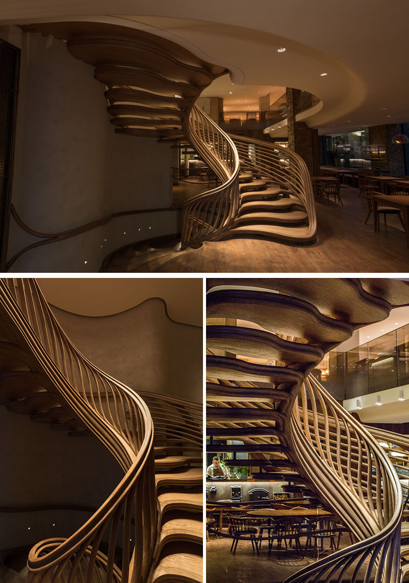 Atmos Studio have designed a sculptural wood spiral staircase that's the centerpiece for the 3-storey HIDE restaurant in London. Click through to see more photos of the staircase. #SpiralStairs #SculpturalStairs #Architecture #Design #WoodStairs