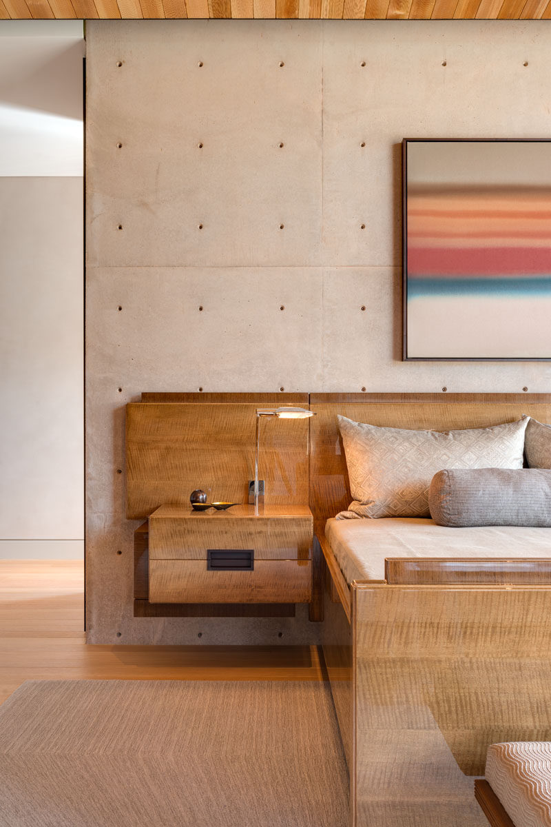 Cast in place concrete walls have been used as a design element in this modern bedroom. #ConcreteWalls #BedroomDesign