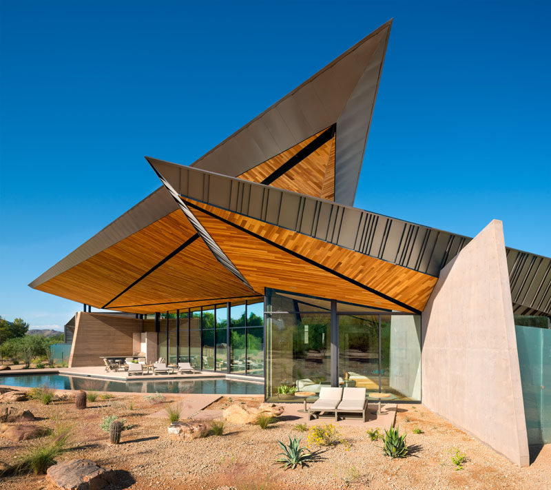 Kendle Design Collaborative were inspired by desert forms, indigenous materials, natural light, and mountain views, when they designed this house in Paradise Valley, Arizona. #ModernHouse #ModernArchitecture #Sculptural