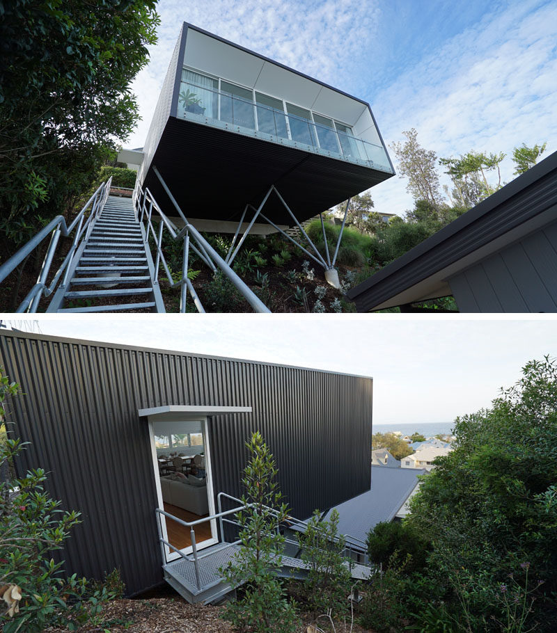 An industrial galvanized steel set of stairs leads to this modern and minimalist backyard studio. #Stairs #OutdoorStairs #Architecture