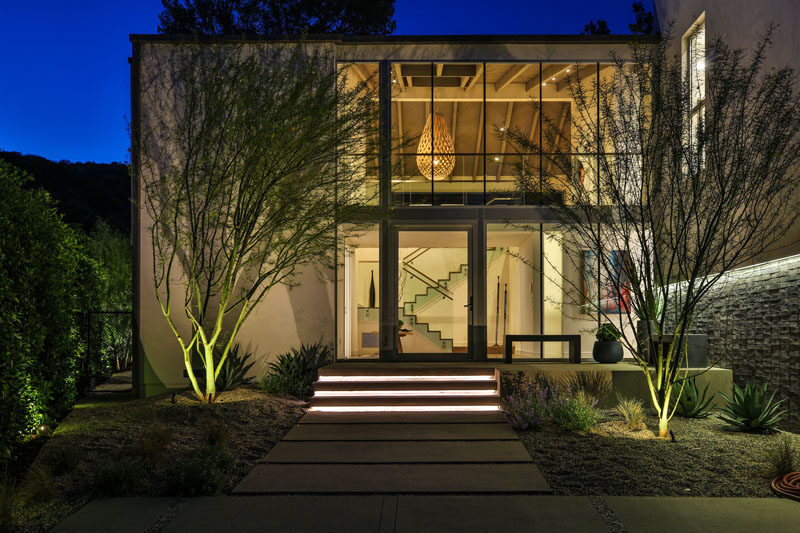 Assembledge+ have designed the modern renovation of a 1970s home in Los Angeles, and turned it into a two-storey house that features the main living areas on the second floor. #Architecture #Windows #ModernHouse