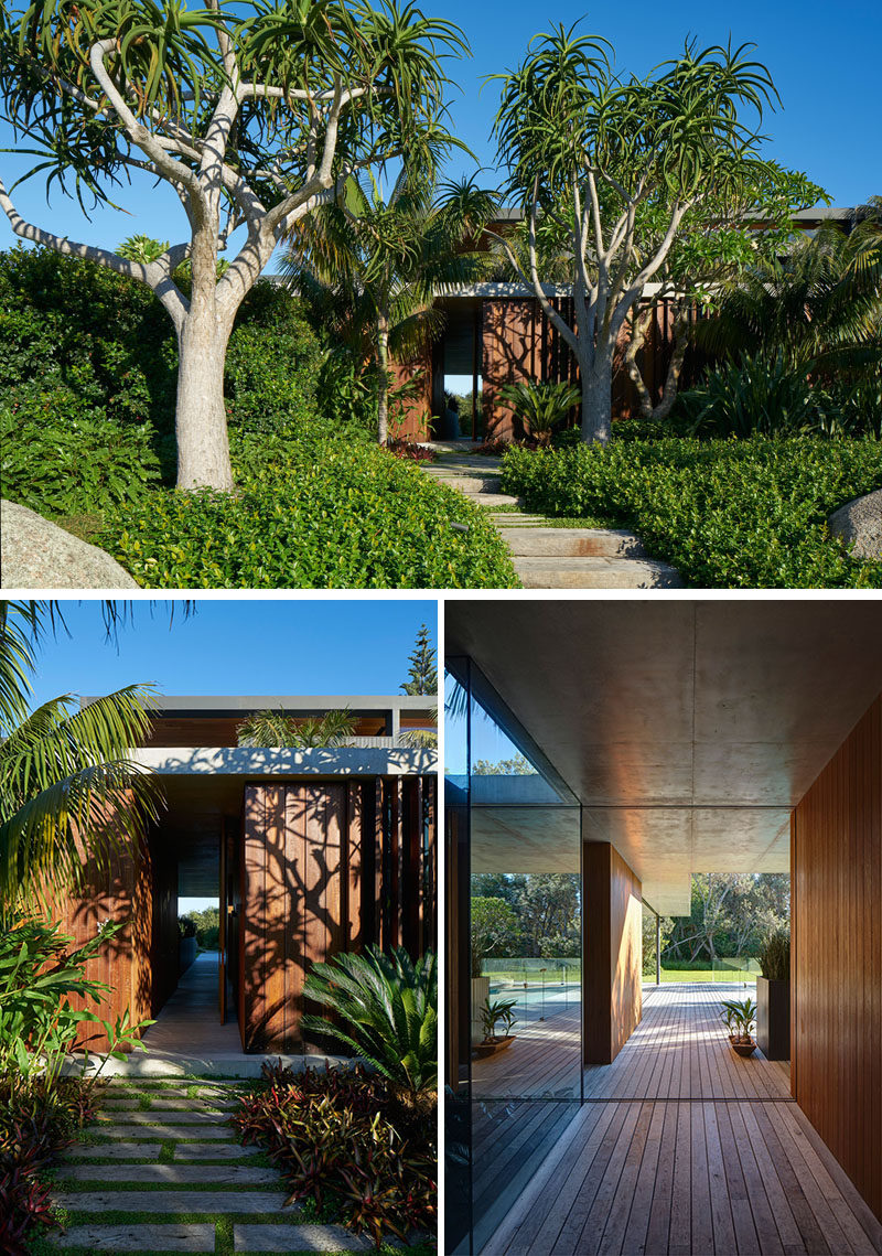 This modern house has lush landscaping with a path that leads to the front door and adds to the overall curb appeal of the home. #Landscaping #Garden #CurbAppeal