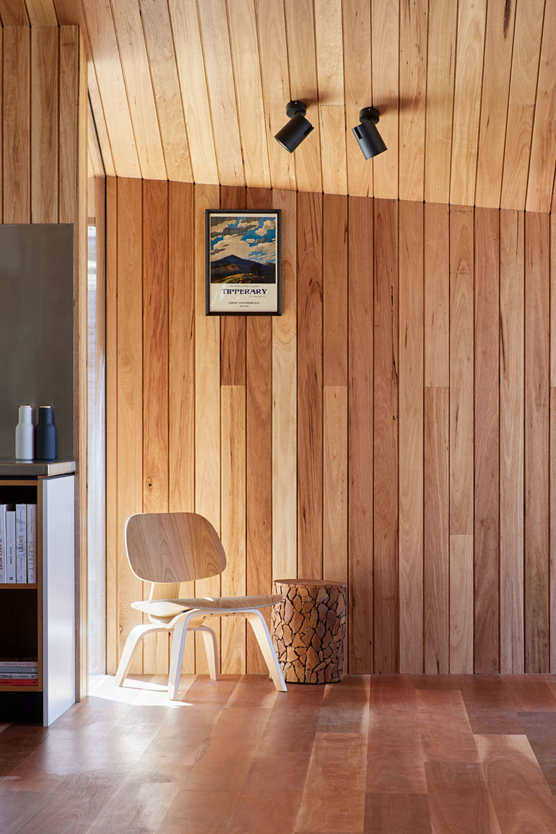 Silvertop ash lining boards have been used to cover the ceiling and walls throughout the interior of this modern house addition. #WoodWalls #WoodCeiling #WoodFloors #WoodInterior