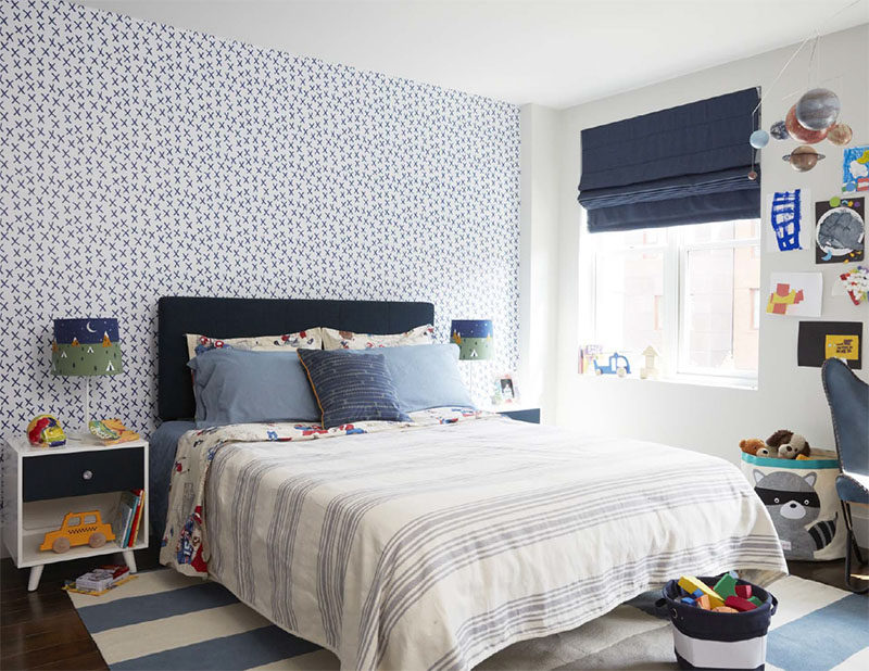 In kids modern kids bedroom, decorative wallpaper adds a graphic touch, while blue design elements have also been included. #Bedroom #KidsBedroom