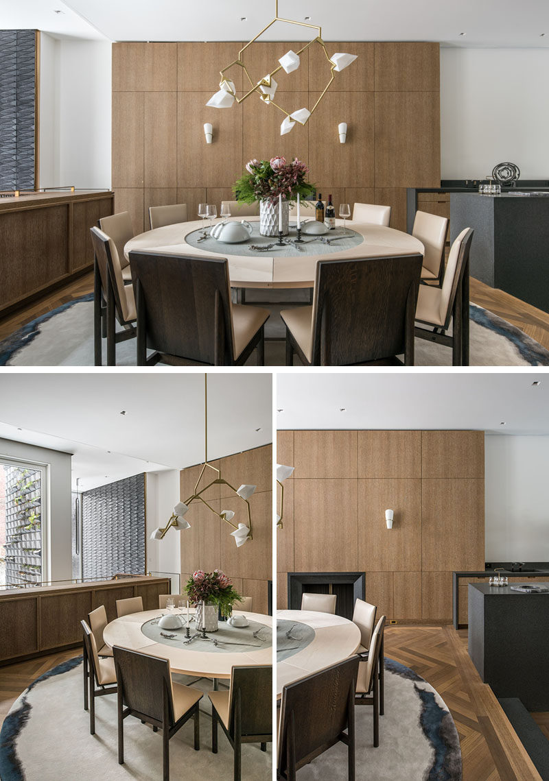 In this contemporary dining room, custom dining room chairs by Christopher Kurtz, have been paired with a vintage dining table by Poul Kjaerholm, and a custom Seed chandelier by Bec Brittain. #DiningRoom #RoundDiningTable #Lighting