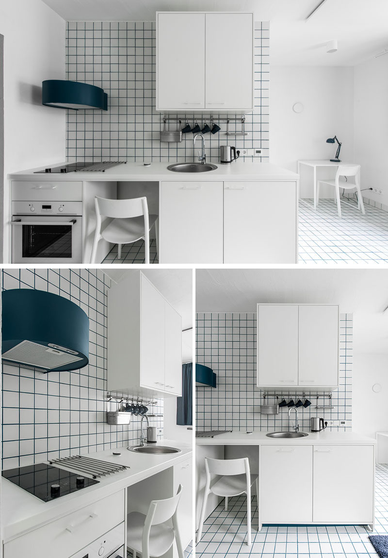 This small white kitchen adds a pop of color by using blue grout. #SmallKitchen #BlueGrout #WhiteKitchen #Kitchenette