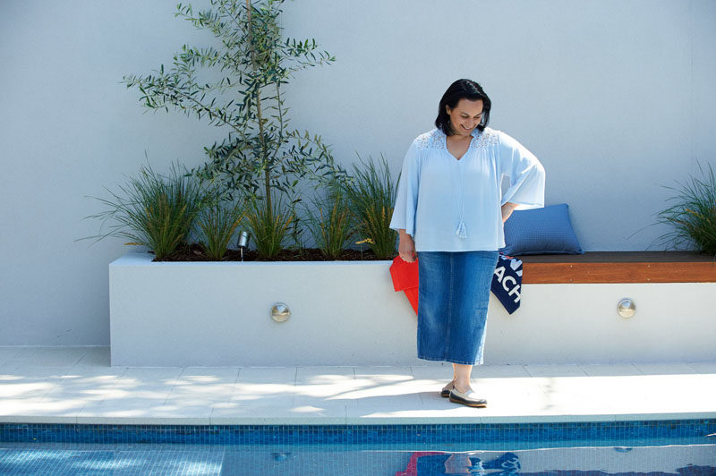 This modern pool area has built-in planter boxes and bench seating. #Planters #BenchSeating #Landscaping #Garden