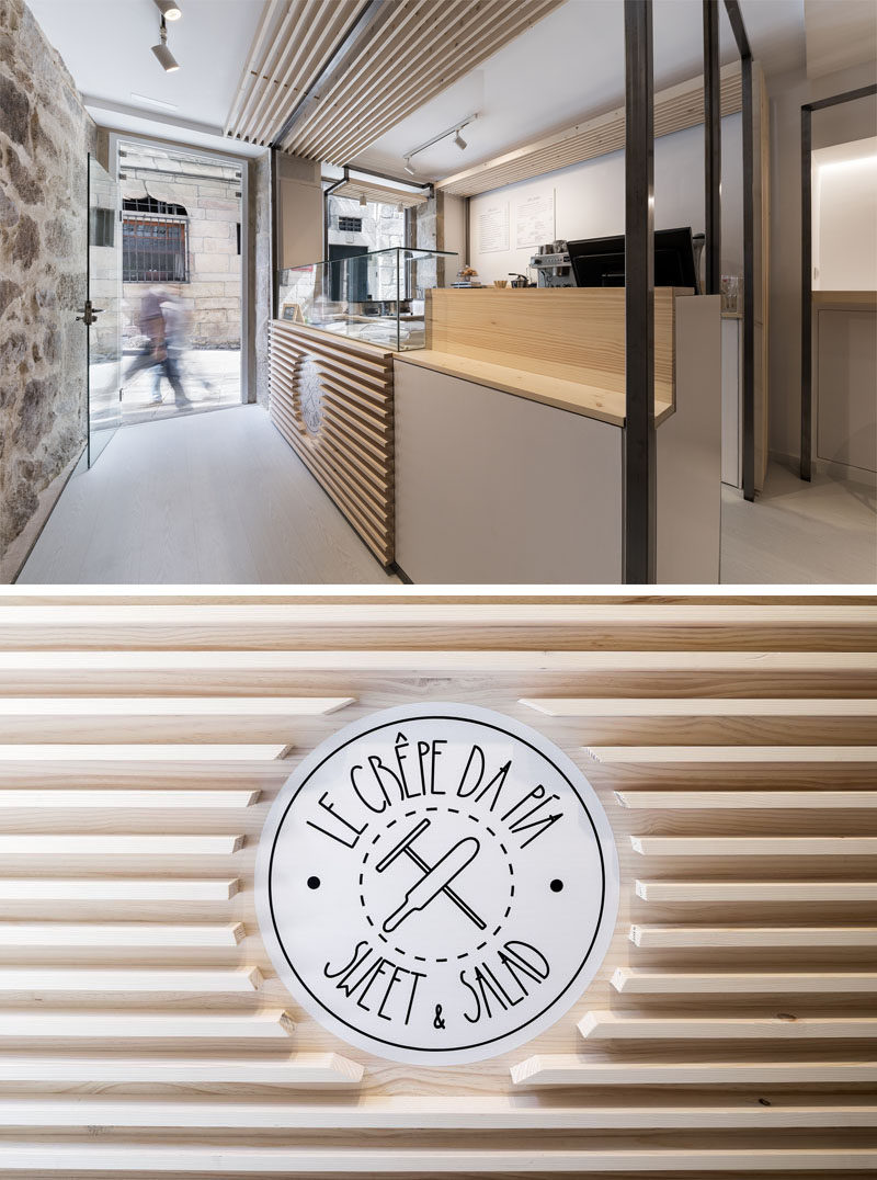 Erbalunga estudio have designed a creperie in Spain that combines original old stone, and new modern design elements. #Creperie #Cafe #RetailDesign #WoodSlats #Logo
