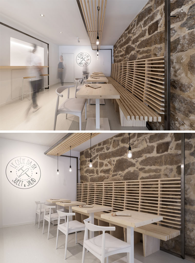 Erbalunga estudio have designed a creperie in Spain that combines original old stone, and new modern design elements. #Creperie #Cafe #RetailDesign #WoodSlats #Logo