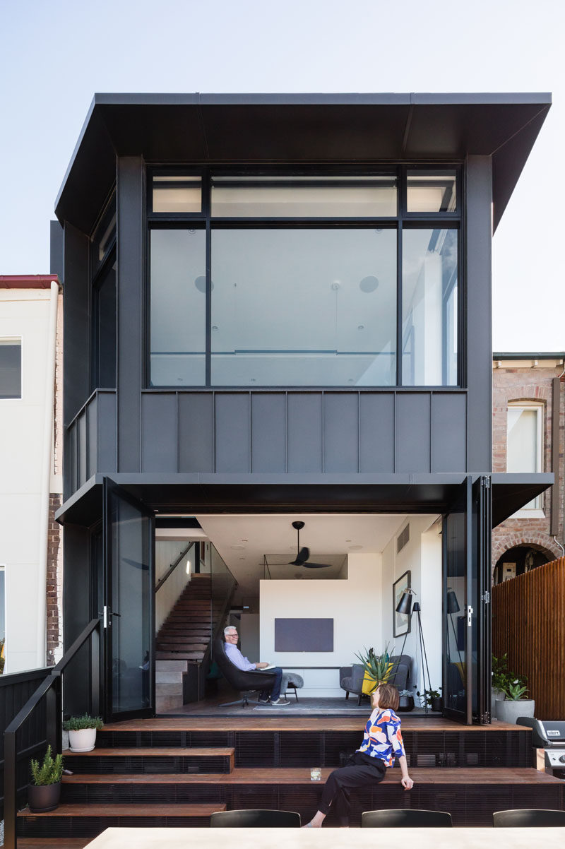 This modern house has bleacher-style steps extending the study and sitting room, forming an additional living space. #ExteriorStairs #ModernHouse