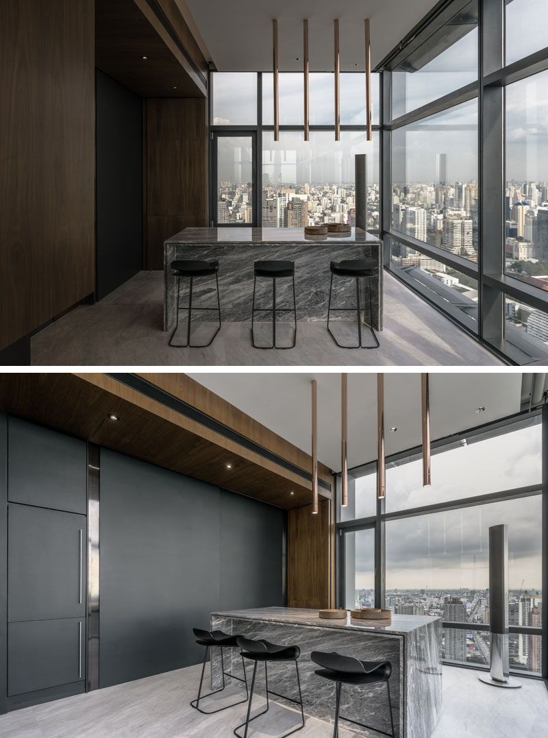 This modern and versatile island counter area can be converted into a bar for evening entertainment. #Kitchen #KitchenIsland #Bar