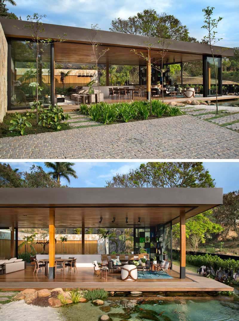 The structure of this modern house appears to float above a natural pool, creating the feeling that the landscaped elements were already on site before the construction. #NaturalPool #Architecture #Landscaping #GardenDesign #WaterFeature