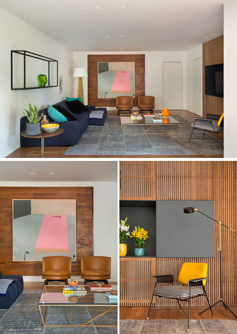 This modern living room features two different wood accent walls. #ModernLivingRoom #WoodAccentWall