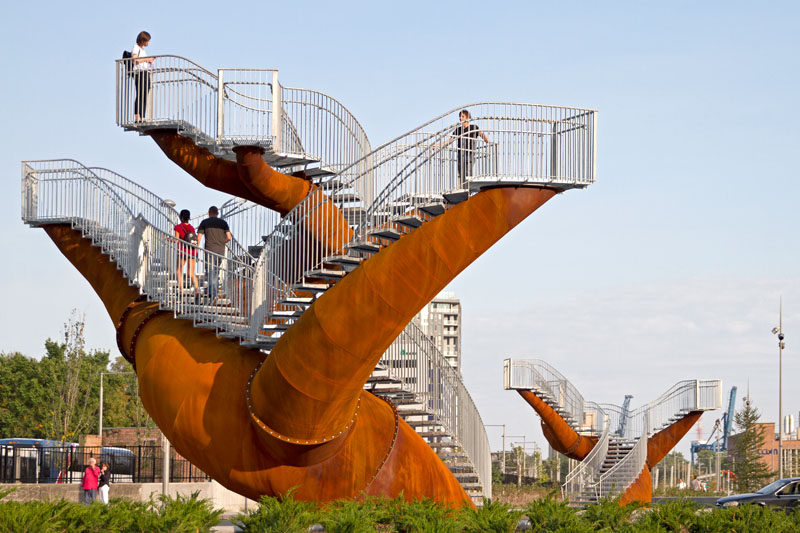 This modern public sculpture in Montreal, Canada, was inspired by neurons and trees. #Sculpture #PublicArt #WeatheringSteel #Montreal