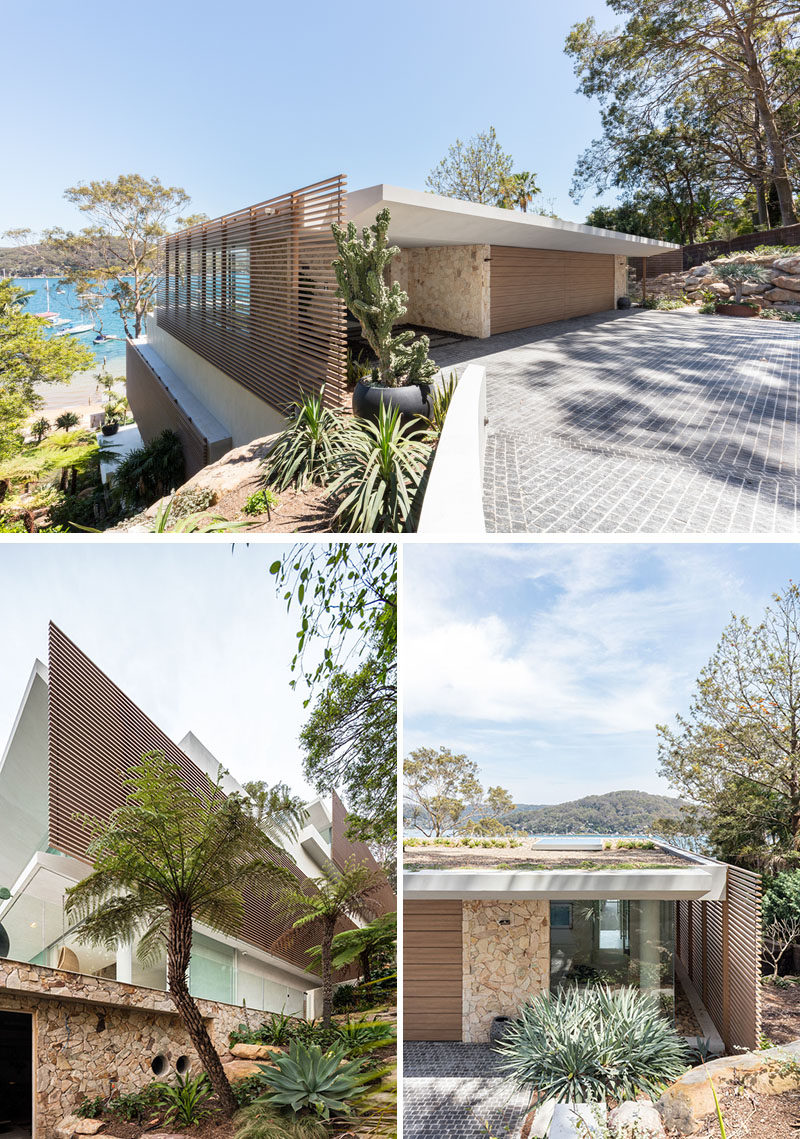 This modern terraced, four level house progressively steps down towards the water, and a series of floating platforms are presented as a sequence of cantilevered concrete slabs that float above a recessed stacked-stone podium. #Architecture #WaterfrontHouse #ModernHouse