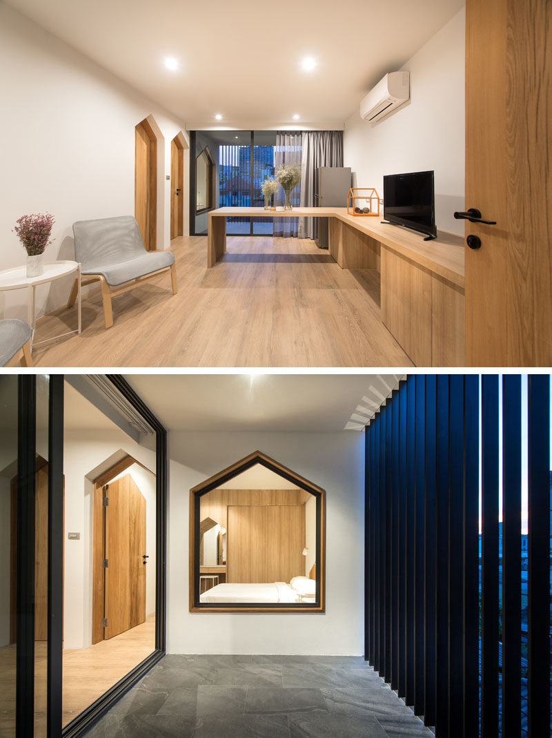 This apartment features gabled design elements in the window frames, door frames, and built-in vanity. #Gabled #InteriorDesign