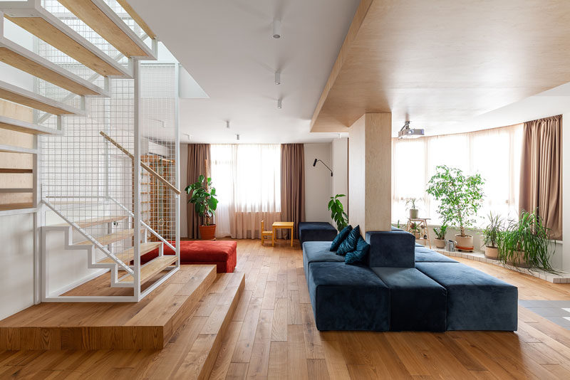 MalyKrasota design have recently completed a multi-floor modern apartment for a family that lives in Kiev, Ukraine. #ModernApartment #Stairs #OpenPlan #LivingRoom #InteriorDesign