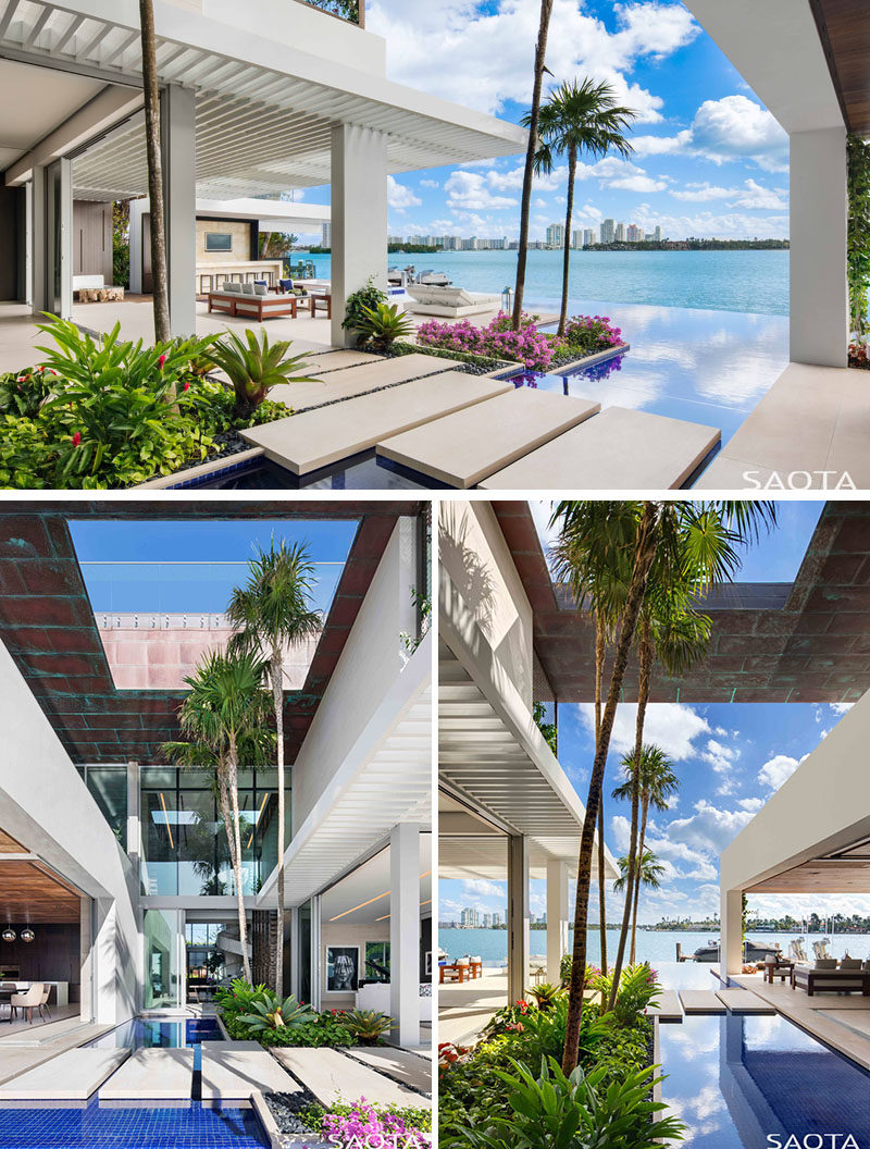 The interior spaces of this modern house flow out onto a spacious deck with semi-covered lounge areas that are connected by 'island' pathways. #OutdoorSpaces #Landscaping #PoolDesign