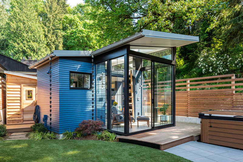 Architecture and design studio Board & Vellum, have created a backyard reading retreat that's surrounded by outdoor seating, a firepit, a hot tub, and a new backyard shed. #BackyardStudio #BackyardRetreat #Architecture