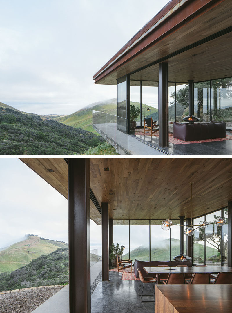 The house has sweeping views of the Pacific Ocean and surrounding rolling hills, that can be seen through sliding glass walls and expansive decks, which cantilever over the foundation’s steep rock face. #GuestHouse #Architecture #GlassWalls #Balcony