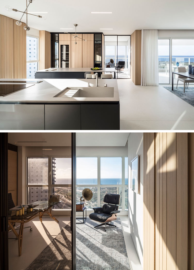 This modern home office of the kitchen, features floor-to-ceiling windows and sweeping views. #HomeOffice #ModernInteriorDesign