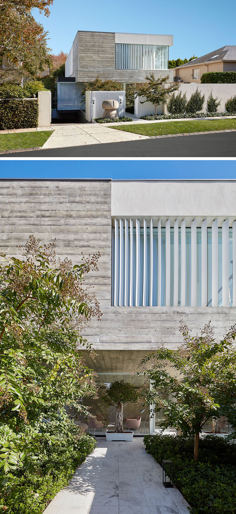 Upon arrival at this modern house, a path surrounded by greenery guides guests to the front door. #Landscaping #CurbAppeal #Architecture