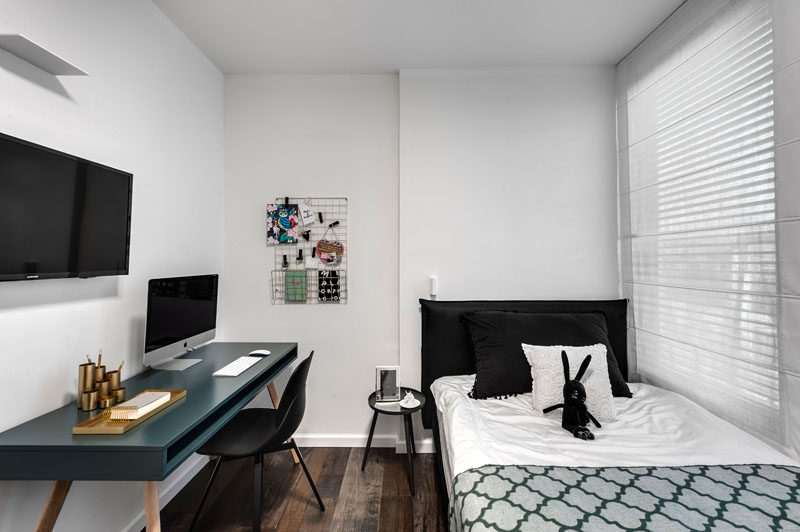 In this modern bedroom, a single bed is positioned by the window, and a desk for study is located on the opposite wall. #ModernBedroom #KidsRoom