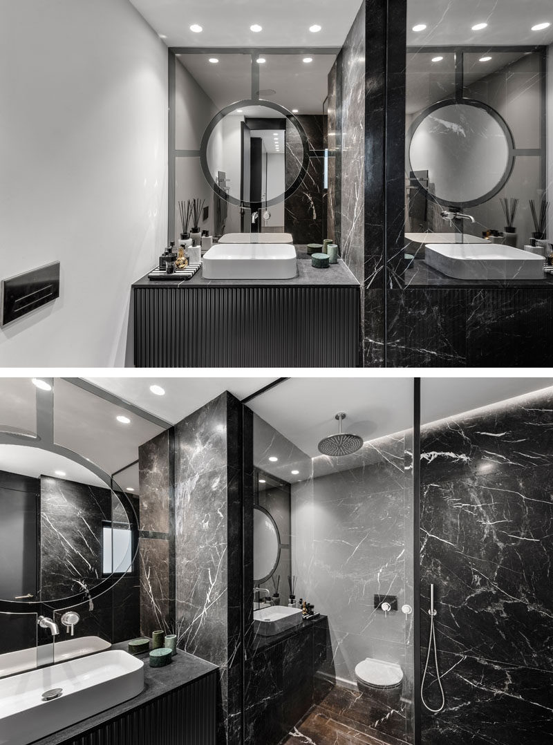 In this master ensuite bathroom, dark elements have been combined with white walls and glass for a luxurious and modern appearance. #ModernBathroom #BlackBathroom