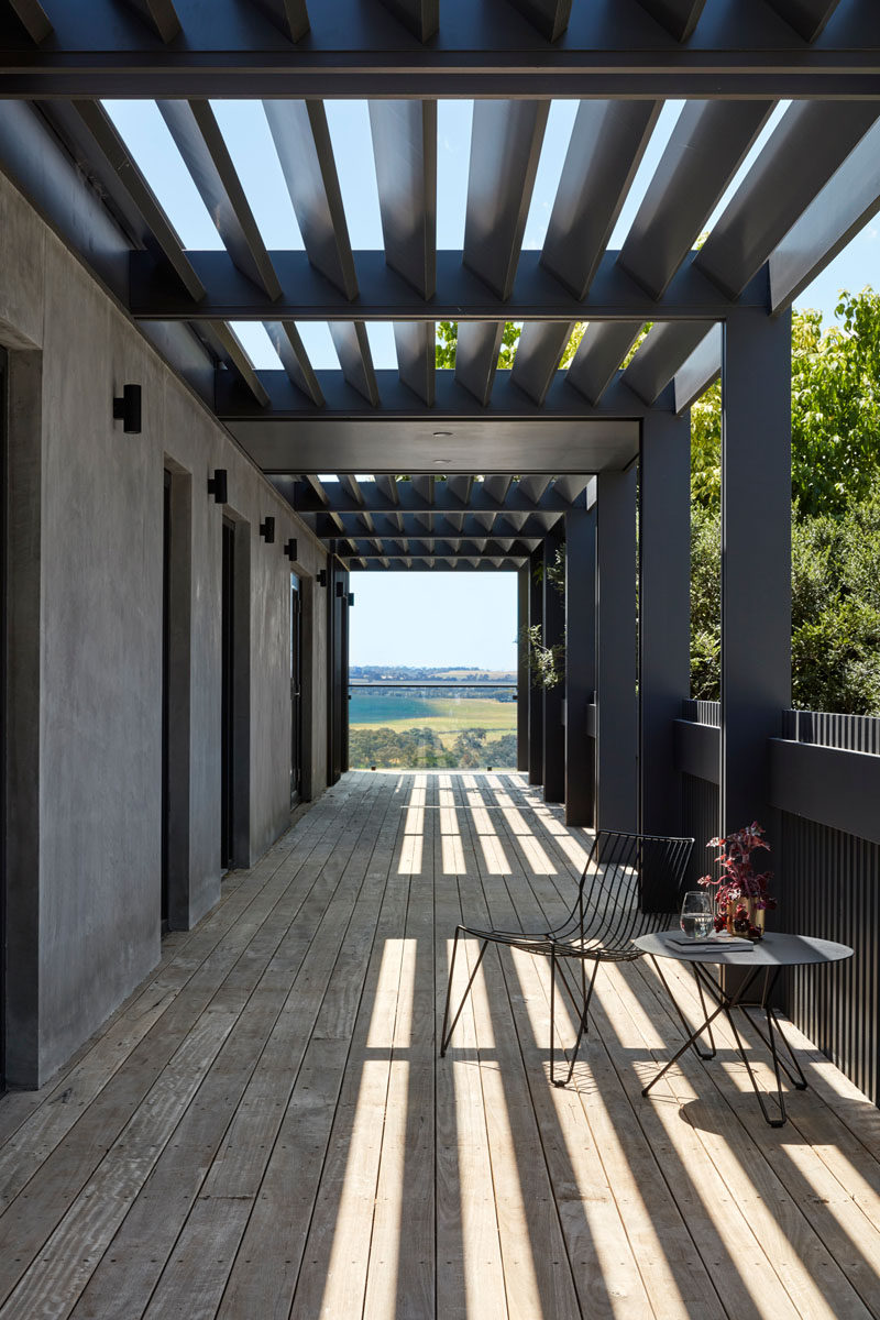 This modern house has a verandah that has views of the countryside. #Verandah