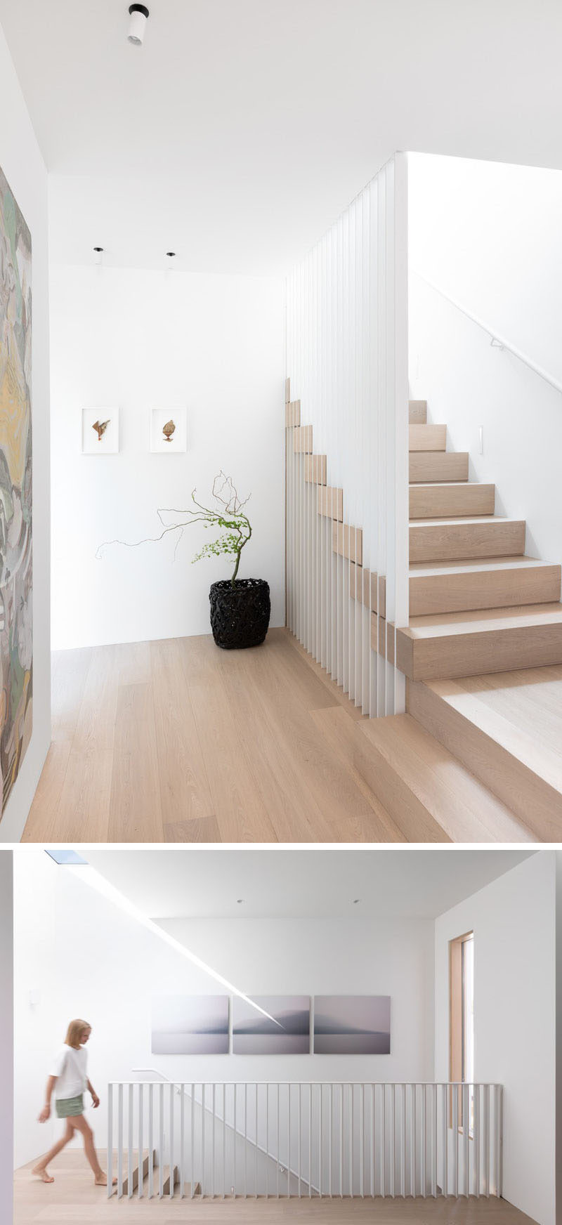 These modern stairs have slatted steel guards that intersect Nordic Oak treads. At the top of the stairs, there's a skylight that provides natural light to the landing. #ModernStairs #WoodAndWhiteStairs