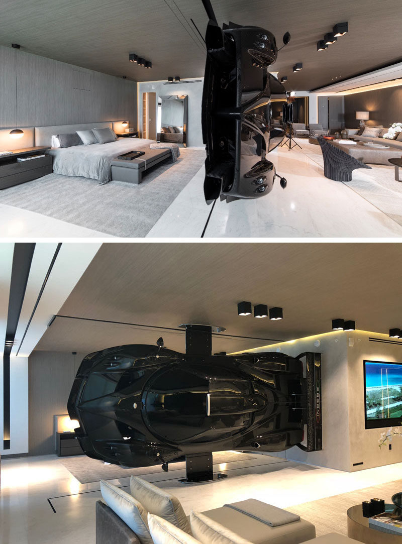 This modern oceanfront condo in Miami has a Pagani Zonda R racing car installed as part of the decor, that serves as a high-impact partition between the living room and master suite. #RacingCar #RoomDivider #ModernInterior